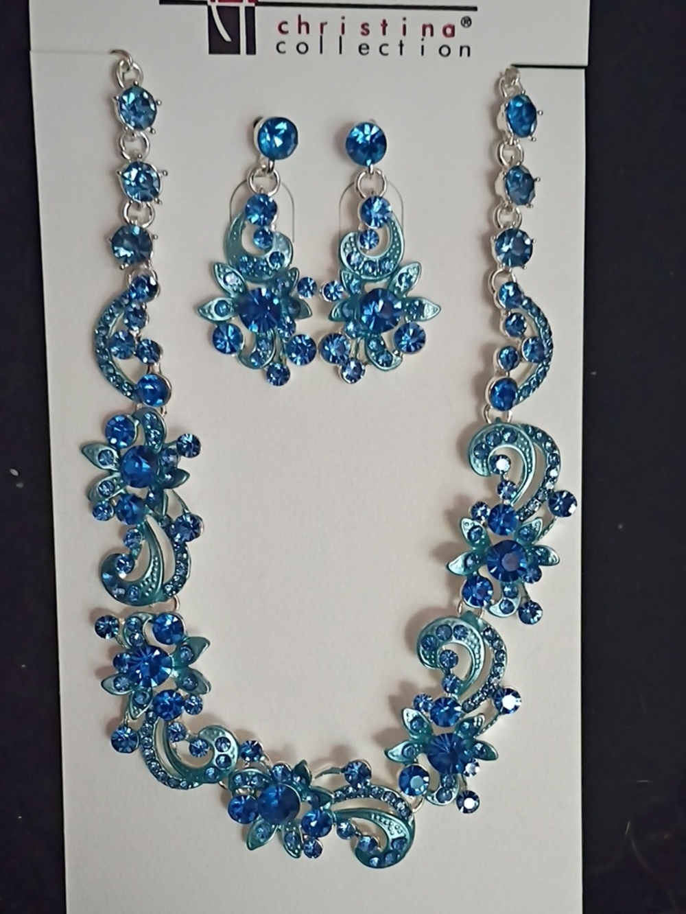 Christina Collection Blue Crystal Floral Necklace and Earrings Set